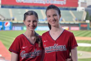 Hadley and Delany in Guardian baseball jerseys